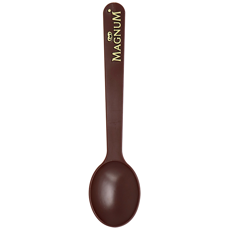 Brown spoon with the words "Magnum"
