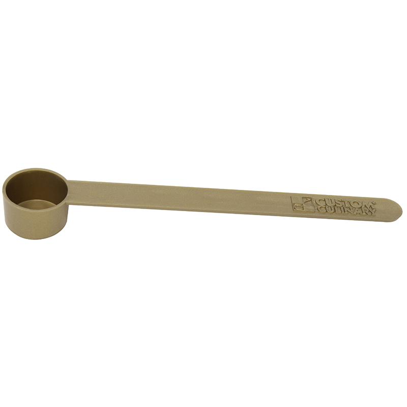 Gold plastic measuring cup
