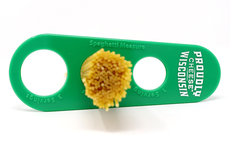 Green spaghetti measure / pasta measurer.