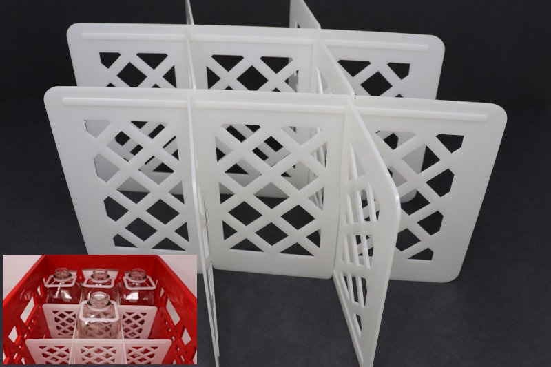 White packaging dividers and an example of it's use in a red crate.