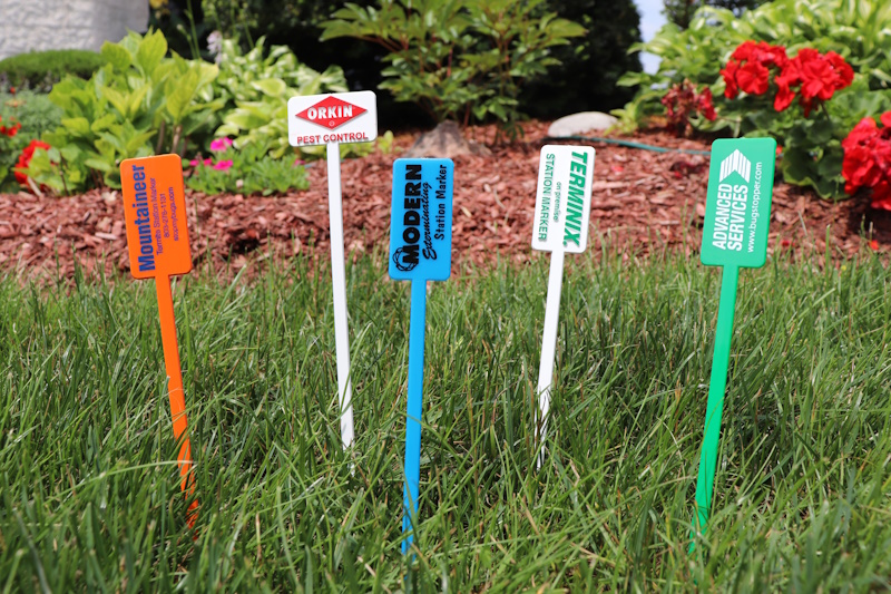 Variety of pest station markers.