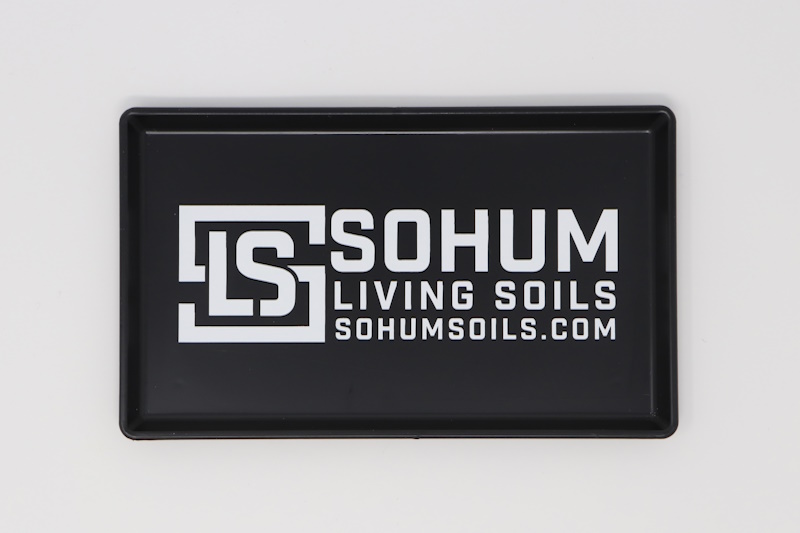 Black plastic rolling tray with a white logo imprinted.