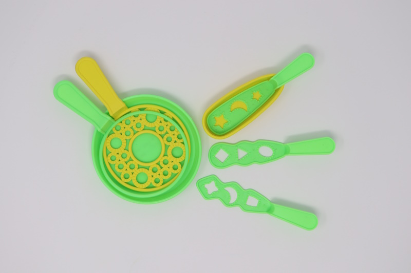 Green and yellow bubble wand set.