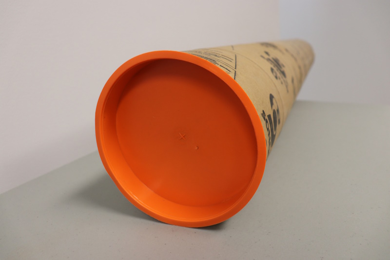 Orange plastic tube cap and plug.